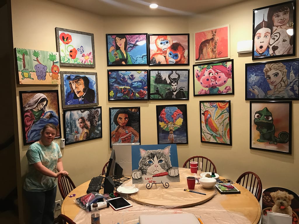 Inside the Change 4 Love studio, its walls covered in paintings